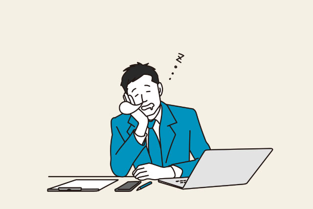 pcを前によだれをたらしながら居眠りするスーツを着た男性